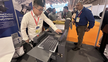 Sheet laminating machine